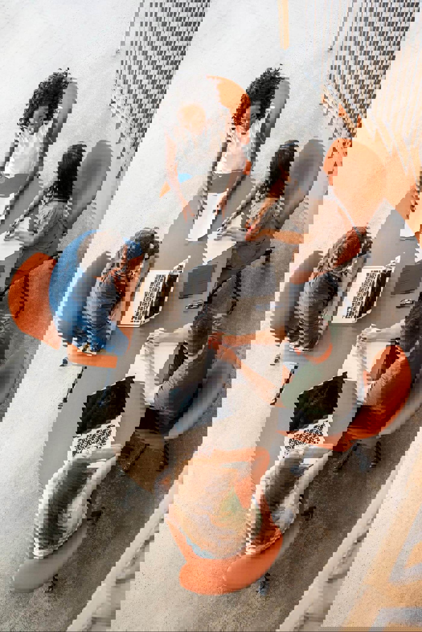 A group of people in a meeting room