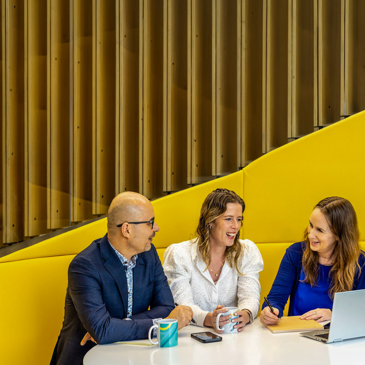Legal professionals working together to streamline payroll workflows and improve reporting using Jemini Payroll