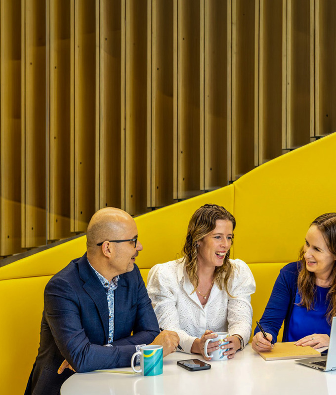 Legal professionals working together to streamline payroll workflows and improve reporting using Jemini Payroll